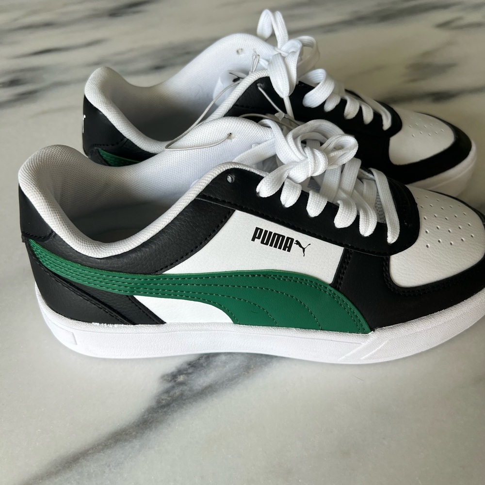 New. Men size 7 Puma sneakers